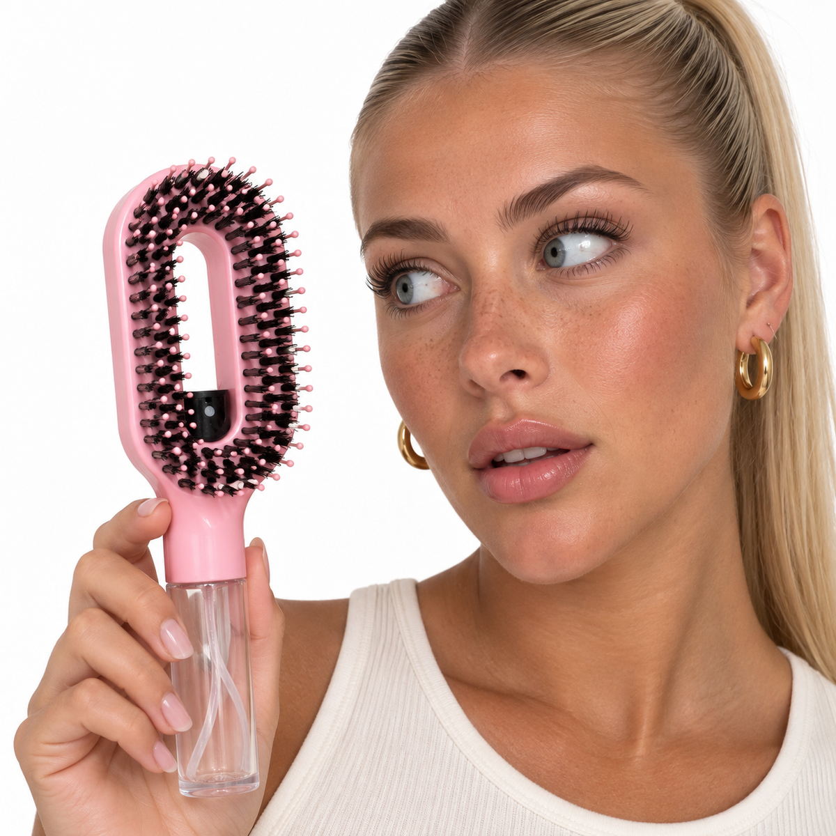 MistGlow™ Spray Hairbrush.